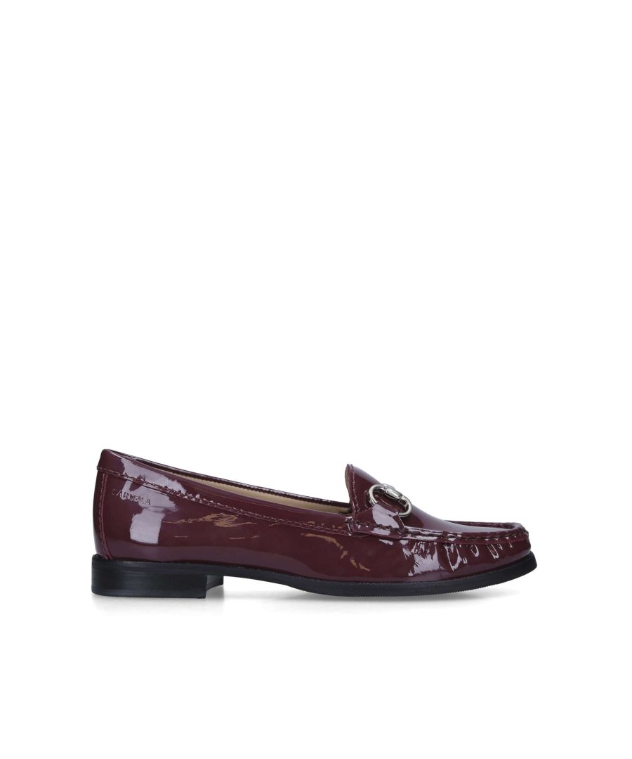 The Click loafer features a burgundy upper in patent leather which slips onto the foot. The toe is finished with golden tone horsebit chain.
