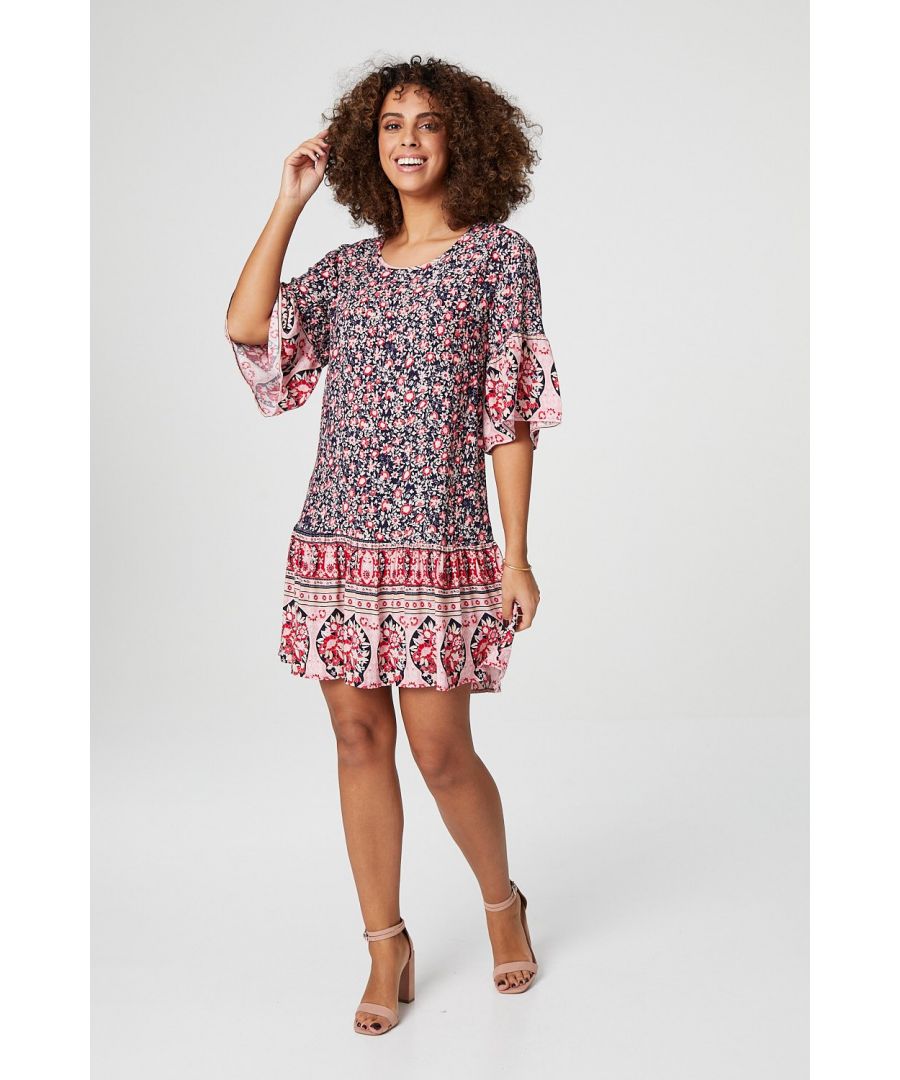 Add a sunshine ready smock dress to your collection with this floral border print swing dress. With a round neck, short flared sleeves and a tiered short skirt. Pair with strappy heels for a lunch date or dress down with trainers.