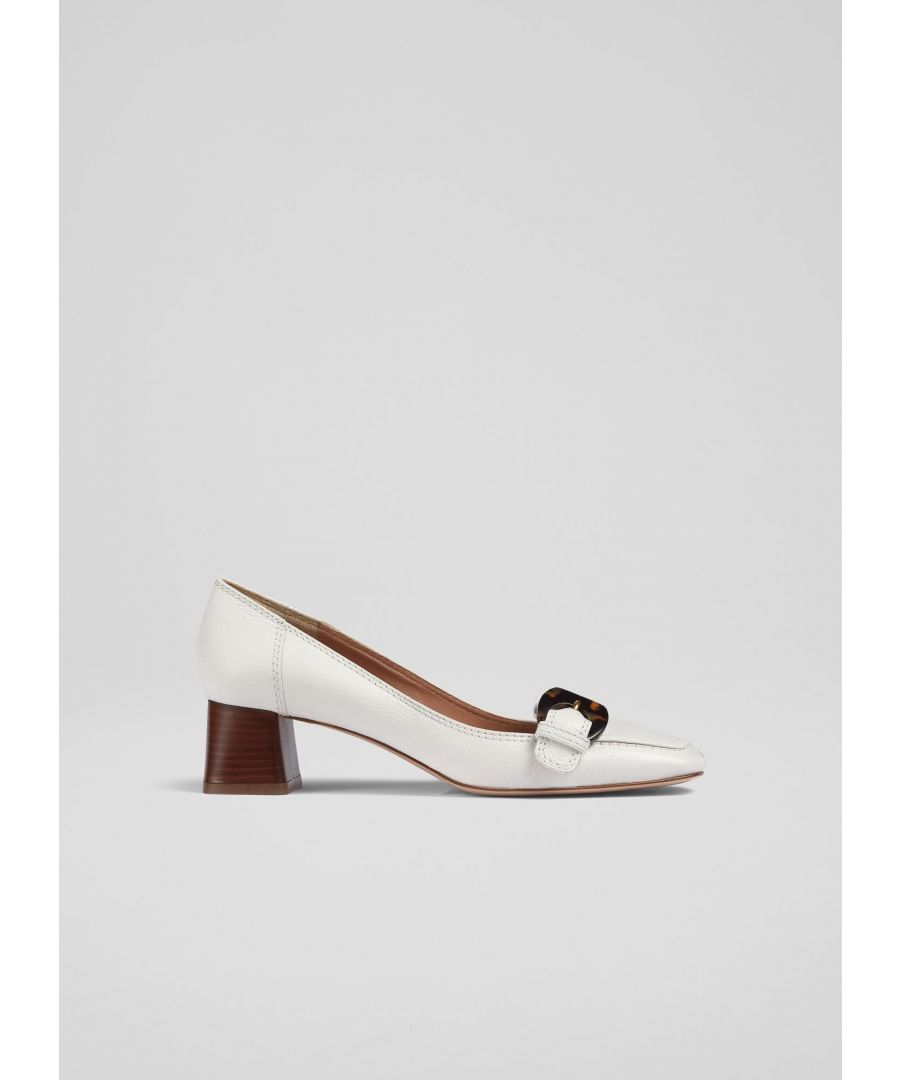 The Felicia heeled loafers pay homage to the preppy elegance of the 1960s. Crafted in Italy from elegant white grainy leather, they have a squared-off toe, a stylish tortoiseshell effect Perspex buckle, top stitch detail and a softly-squared, stacked block heel. Wear them with a wide leg pair of trousers or a mini skirt.