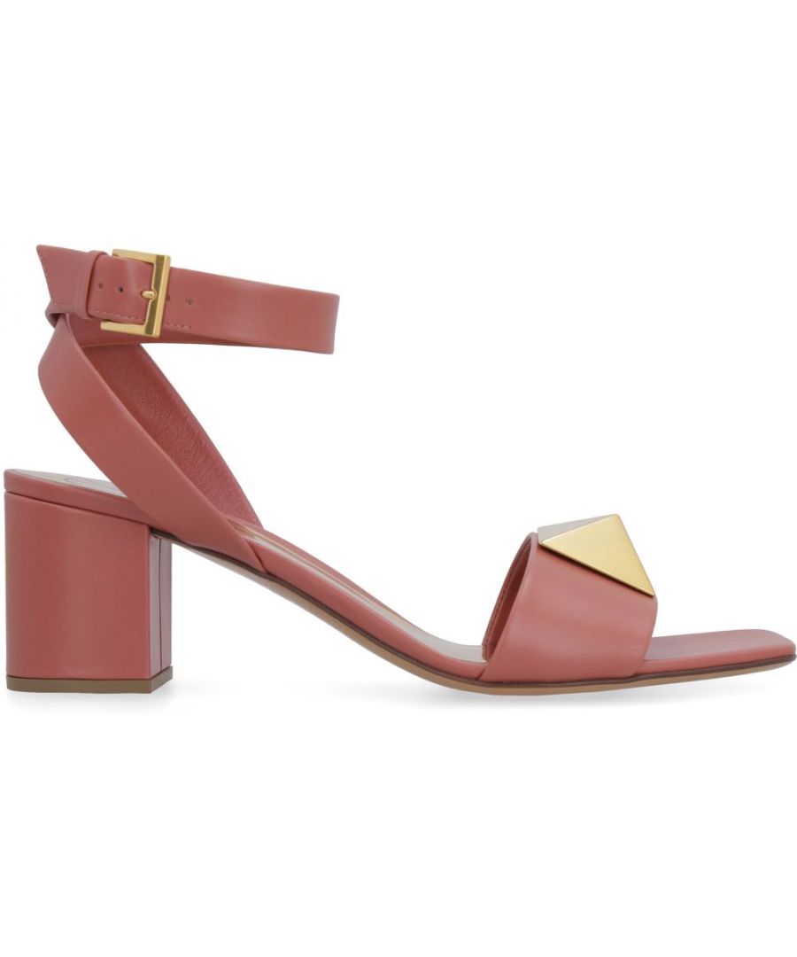 Adjustable ankle strap with buckle. Gold-tone metal hardware. Block heel. Square toe line. 100% Calf Leather.