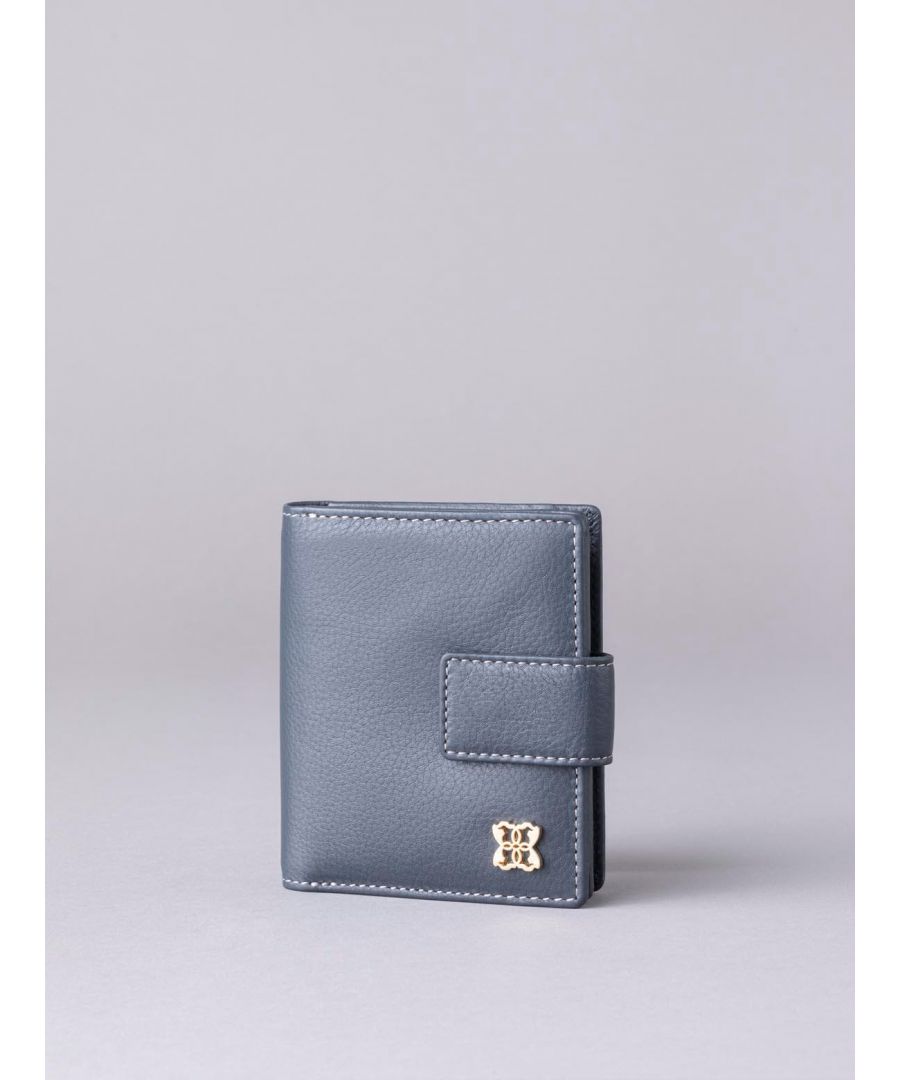 If you're looking for a stylish and compact purse to carry all your spending essentials, look no further than the Rickerlea Small Leather purse. Crafted from quality leather in an elegant navy colourway, this purse is packed with storage for your cards, coins and notes, including twelve card slots, a zip around coin compartment and note section. The Rickerlea also comes with RFID protection to help ensure your card data stays safe.