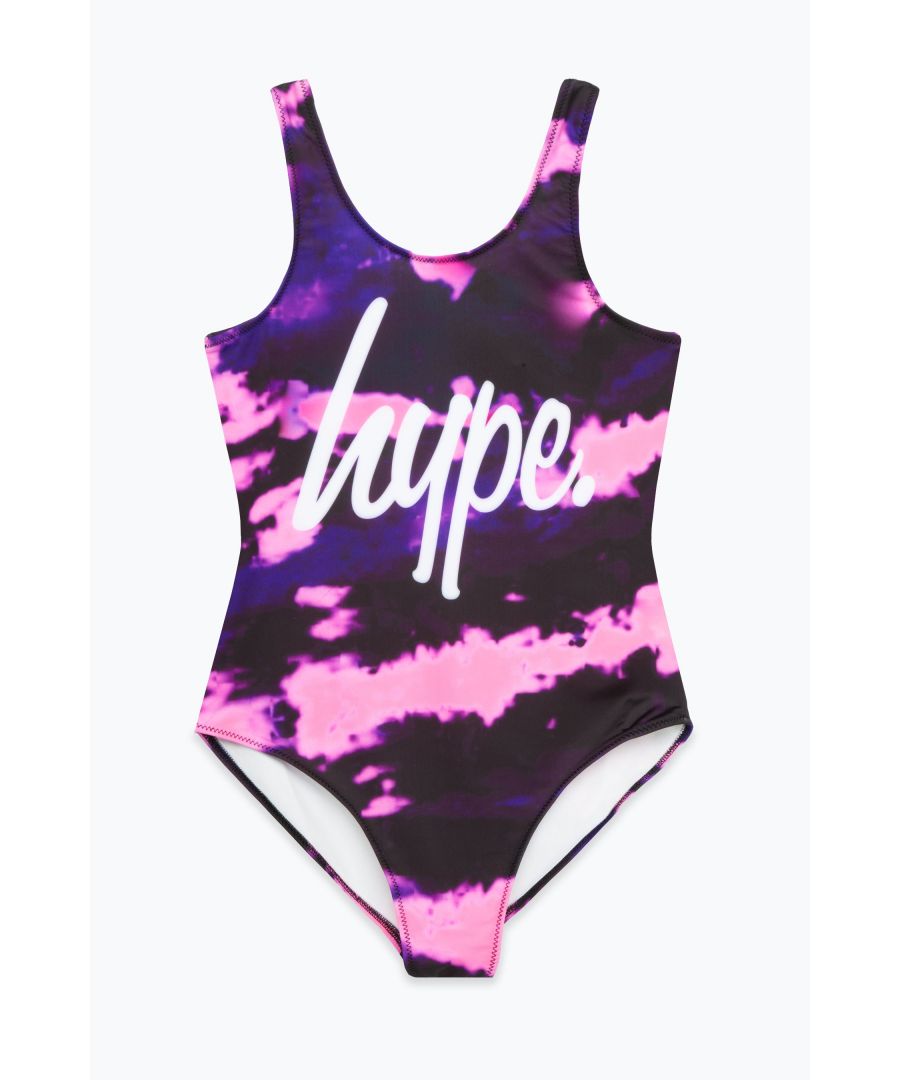 Swim is in. Meet the HYPE. Girls Purple Tie Dye Script Swimsuit, the ultimate girls swimsuit you'll want to wear everyday of summer, autumn, winter and spring. Designed in our standard black kids swimsuit shape, boasting an all over purple tie dye print and the iconic HYPE. script logo in contrasting white. Wear with HYPE. sliders, swimming goggles and a beach towel in hand. Machine wash at 30 degrees.