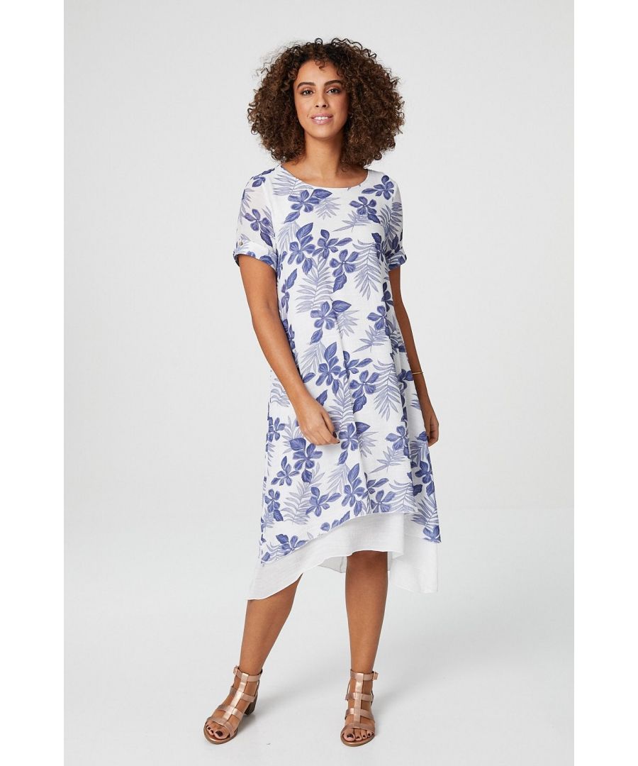 Add a lightweight tunic dress into your collection with this floral print midi dress. With a round neck, short turn-up sleeves with delicate button details, a layered hanky hem sitting below the knee and a relaxed fit. Pair with low sandals for a sunshine friendly daytime look.