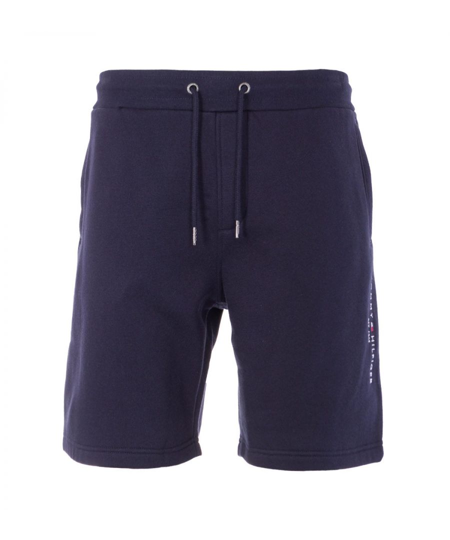 Made with comfort and sustainability in mind, these shorts from Tommy Hilfiger are crafted from their signature organic cotton blend flex fleece, providing a sung yet lightweight feeling. Featuring an adjustable drawstring waist, twin welt side pockets and rear patch pocket. Finished with a round Tommy Hilfiger logo printed at the left leg. Regular Fit. Organic Cotton & Polyester Flex Fleece. Twin Welt Side Pockets. Rear Patch Pocket. Tommy Hilfiger Branding. Style & Fit. Regular Fit. Fits True to Size. Composition & Care: 63% Organic Cotton 37% Polyester. Machine Wash.
