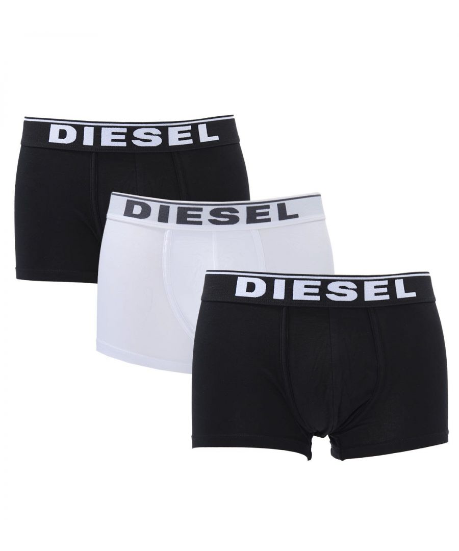 Inject some Diesel DNA into your everyday essentials. Delivering comfort, reliability and style, this three-pack of basic boxer trunks are crafted from stretch cotton and feature an elasticated waistband with iconic Diesel branding. Three Pack, Stretch Cotton, Elasticated Waistband, 95% Cotton & 5% Elastane, Diesel Branding.