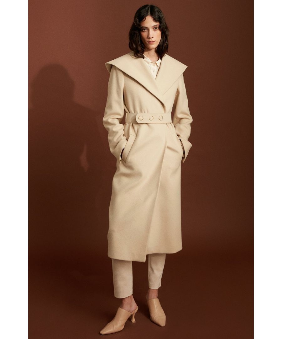 Enduringly elegant, this plush cream coat pairs perfectly with both casual and work wear. This sumptuous piece is crafted with an exaggerated hood, perfect for turning up against the wind to keep you warm. The wrap close is finished by a wide feature belt and oversized collar.\n\nFront pockets\nBelted\nOversized hood\nLong sleeves\nMid-calf length\nModel is 5'10