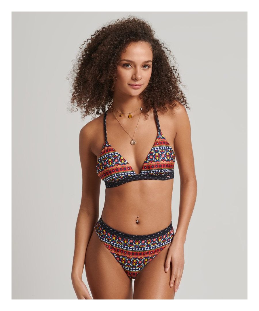 Whether you're hitting the water or soaking up some rays, our Vintage T-Back Triangle Bikini Top gives you an authentic style, especially with the vintage vibe of a nostalgic Hawaiian print. A secure fitting allows you to feel confidentially beach ready.Spaghetti strapsTriangle topElasticated hemAdjustable T-backRemovable cupsClassic Superdry metal tabRecycled contentBy 2050, there will be more plastic in the ocean than fish.Help save plastic from polluting the earth. Wear this instead.This new swimwear fabric is made from 80% recycled post-consumer waste.