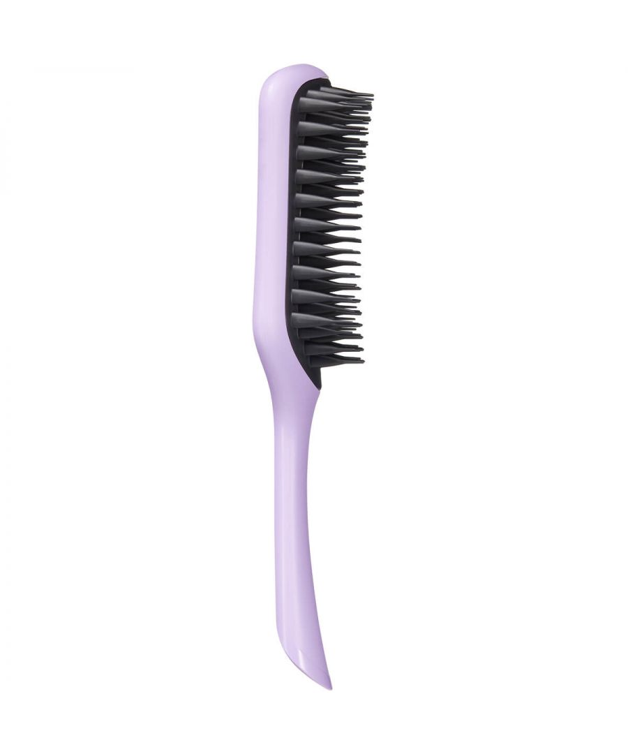 Blow drying brush for long and wavy hair types\n\n\n\n\n\nVented large blow-dry hairbrush\n\nBottle-shaped teeth press water out of your hair\n\nSpeeds up drying time and reduces heat damage\n\nBoosts natural volume, shine and smoothness\n\nReduces snags, breakages and pulling\n\nUse to create sleek styles whenever you blow-dry your hair\n\n\n\n\n\nMade for long, wavy hair types, Tangle Teezer Large Easy Dry & Go delivers seriously smooth results. This large vented blow dry brush makes drying time much quicker, all while reducing frizz and boosting your hair's natural volume.\n\nBottle-shaped teeth cleverly press water out of your hair as your brush it. And they do it without pulling or snagging your hair too. Pair them with the brand's innovative vent and you've got everything you need to achieve a healthier blow-dry at home.\n\nUse whenever you wash your hair to slash your drying time and reduce heat damage. Brush from underneath to boost your root's lift and smooth your hair cuticles for glossy, shiny hair styling that last.\n\n\n\n\n\nTangle Teezer Large Easy Dry & Go\n\n\n\n\n\n READ MORE\n\n\n\n\n\nIt's as simple as\n\nStep 1: Use on hair that's freshly washed.\n\nStep 2: Brush through your hair as you dry it.\n\nStep 3: Brush from underneath to increase lift.\n\nStep 4: Point your hairdryer nozzle downwards as you brush your hair to reduce frizz and achieve smooth results.\n\nStep 5: Repeat until your hair is completely dry.\n\nStep 6: Clean and store.\n\nTop tips & tricks for cleaning your Tangle Teezer\n\nStep 1: Remove any loose hair from the teeth with your fingers.\n\nStep 2: Fill a bowl with warm soapy water.\n\nStep 3: Use an old, but clean toothbrush and dip it into the water.\n\nStep 4: Gently brush in between the teeth to remove any product build-up.\n\nStep 5: Leave the brush to air dry naturally. If cleaning a blow-styling brush, you can dry the teeth with your hairdryer.\n\n\n\n\n\n\n\n\n\n\n\n\n\n\n\nDiscover more\n\n\n\n How to use the Easy Dry and Go blow dry brush by Tangle Teezer!