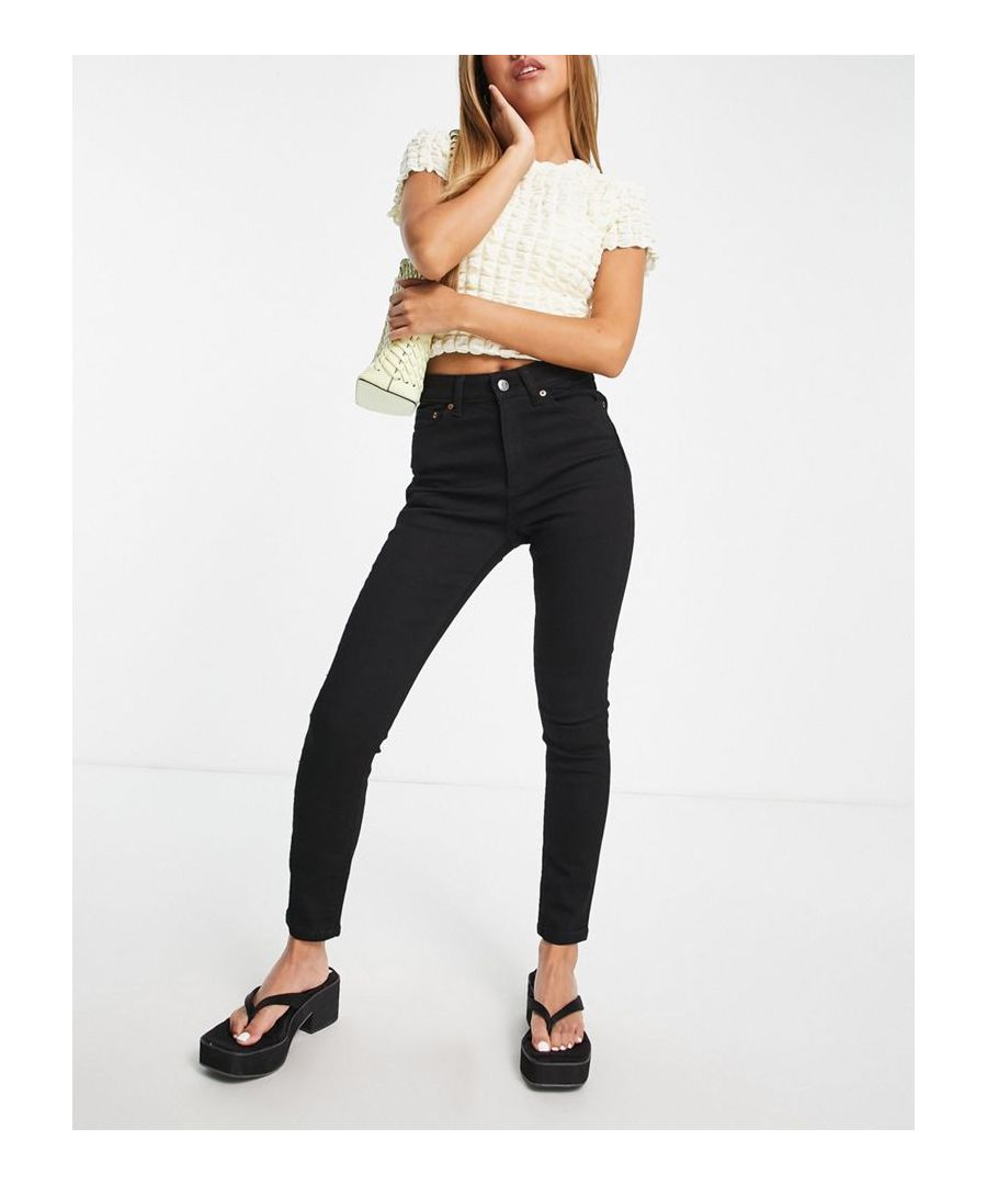 Petite jeans by ASOS Petite It's all in the jeans High rise Belt loops Functional pockets Engineered seams to reverse for a lifting effect Skinny fit Sold by Asos