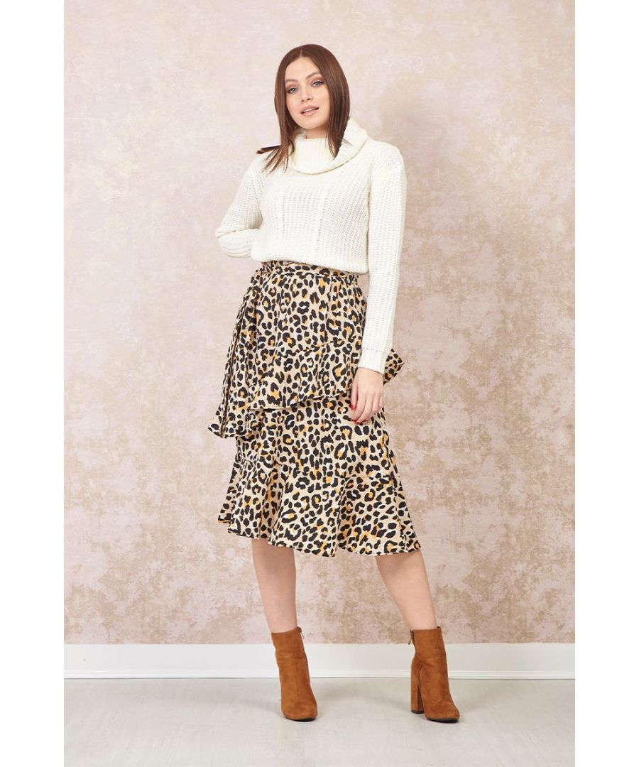 Stay on trend this season and add an edgy animal print skirt to your going out collection. It sits high on the waist with a tie belt, pephem styling and comes in a midi length. Wear with a cami and a biker jacket for an edgy going out look.