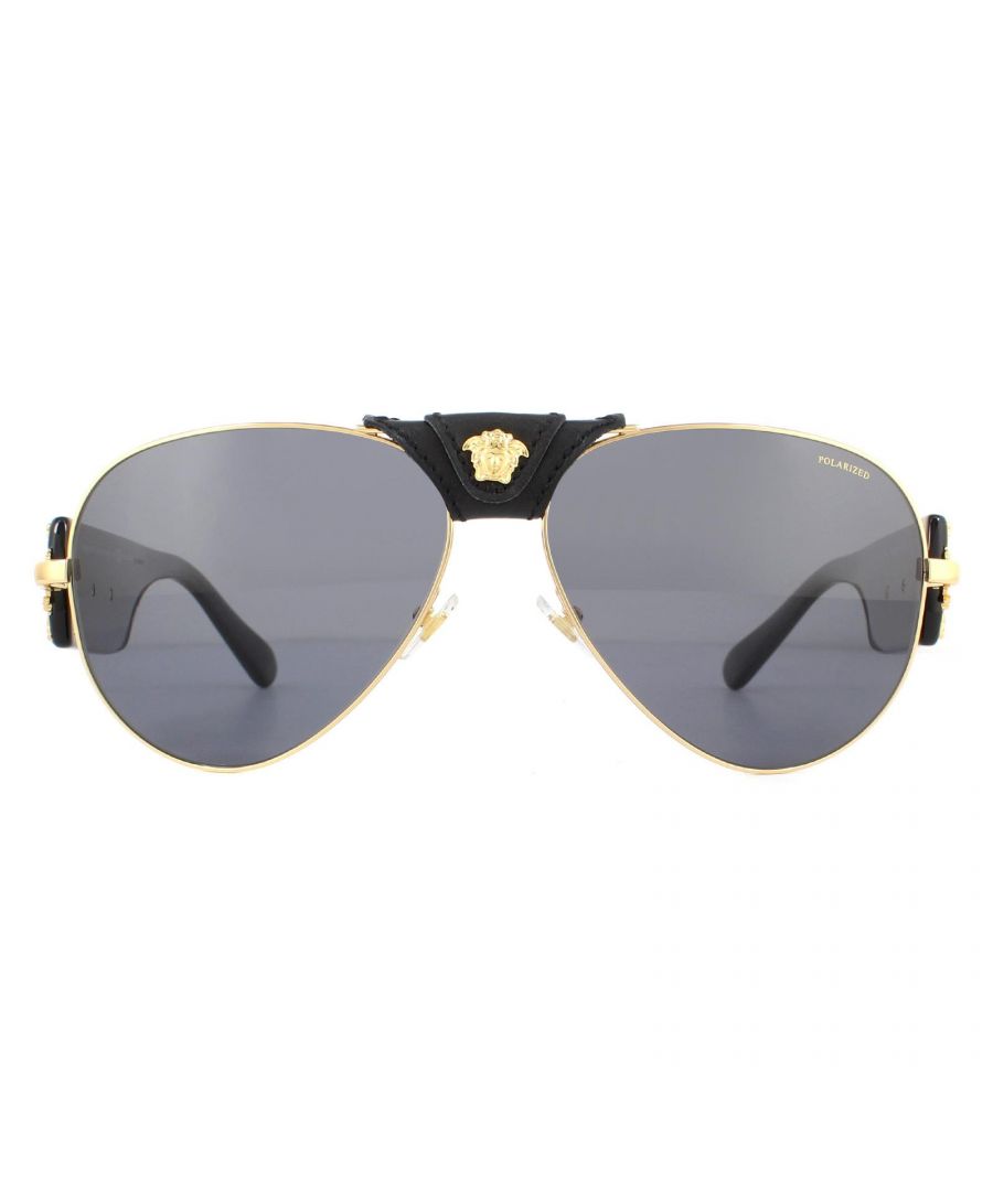 Versace Sunglasses VE2150Q 100281 Gold Dark Grey Polarized are an embellished luxurious aviator style with a truly unique leather bridge design and stunning gold baroque design on the wide temples. We haven't seen as high a quality pilot style as this in a long time!