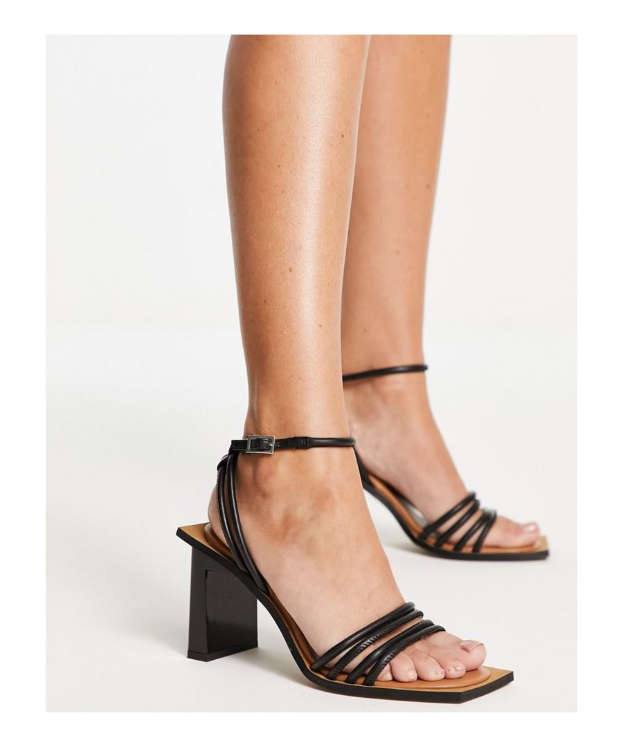 Sandals by Topshop Level up Adjustable ankle strap Pin-buckle fastening Open, square toe High block heel Sold by Asos