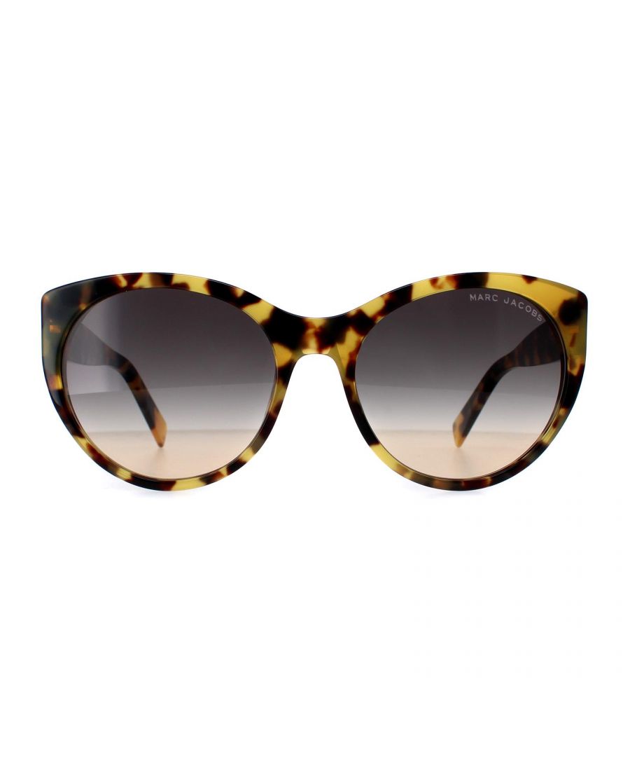 Marc Jacobs Cat Eye Womens Havana Honey Brown Gradient MARC 376/S  Sunglasses feature a cat eye frame that flatters all face shapes. The bold, full-rim design is adorned with the iconic Marc Jacobs logo, adding a touch of elegance and sophistication to the overall look.