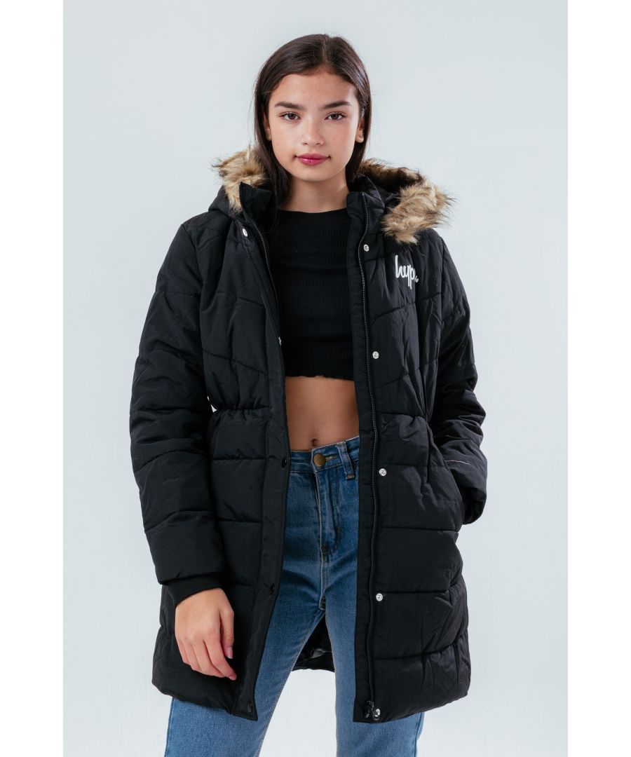 Meet the HYPE. Girls Black Fitted Kids Parka Jacket, here to keep you warm in the colder months. Designed in our girls quilted parka jacket shape. With a black all-over colour and contrasting silver details. Finished with our iconic HYPE. script crest on the front. The design features a fitted waist, perfect for everyday wear. Machine washable.
