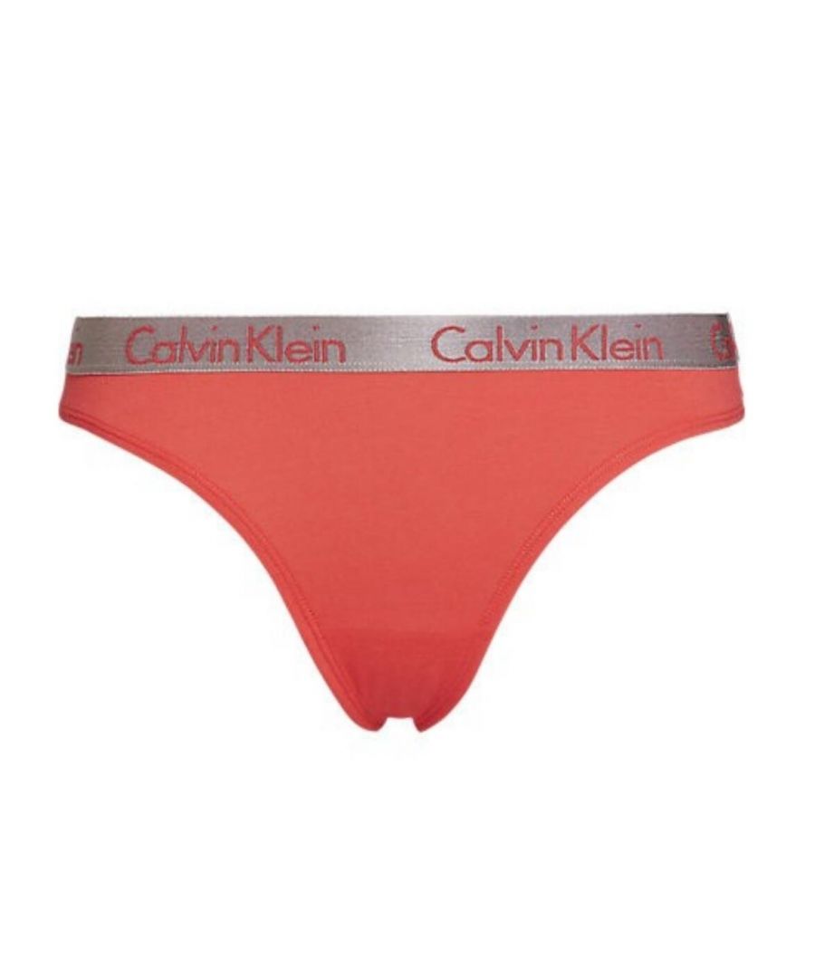 With a stylish twist on the iconic Calvin Klein waistband, Radiant Cotton fuses retro style with modern colours and comfy cotton feel. This popular thong design offers minimal rear coverage for a cheeky fit and is decorated with a metallic CK waistband. Crafted from stretchy cotton for superior comfort, this pair is a must-have in any lingerie drawer.\n\nContemporary design\nPerfect for everyday wear\nMedium rise waist\nCalvin Klein signature logo waistband\nOffers minimal rear coverage\nComposition: 95% Cotton | 5% Elastane\n\nListed in UK sizes