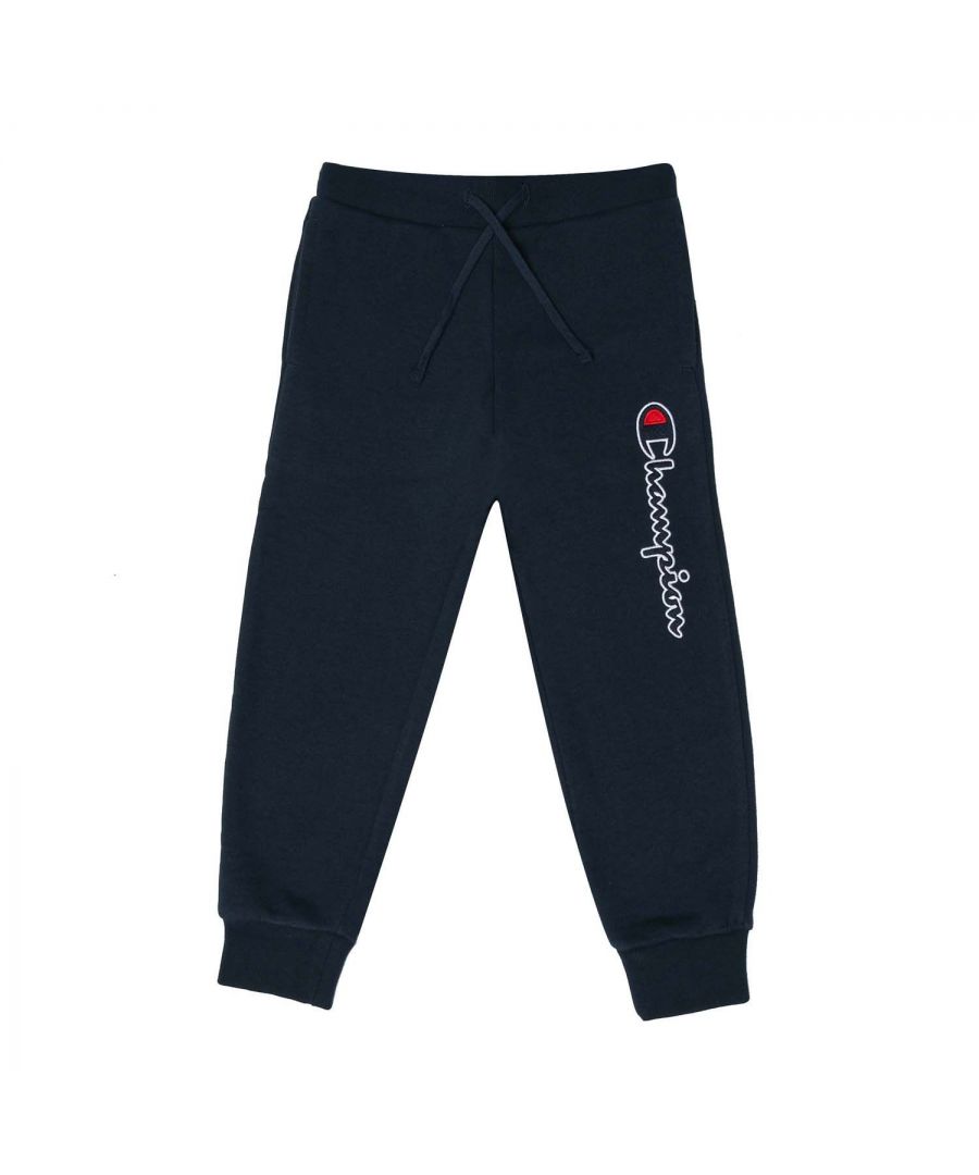 Infant Boys Champion Cuffed Jog Pant in navy.- Drawcord waist.- Two side pockets.- Ribbed cuffs.- Vertical script logo tatami embroidery on thigh.- Regular fit.- Body Fabric: 67% Cotton  33% Polyester. Insertions: 100% Cotton. Rib Trim: 98% Cotton  2% Elastane.- Ref: 305952BS538