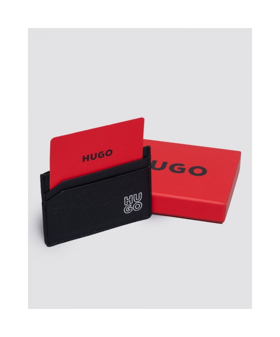 A new-season card holder by HUGO. Featuring a stacked logo for signature edge, this compact card holder is crafted in rich leather with a grained texture. This accessory is delivered in a branded box for easy gifting. Measurements: 10 x 7cm\nLength: 10,0 cmHeight: 7,0 cm1 inside open pocket4 credit card slotsFully linedPrinted LogoPackaging: Box\n100% Cow skin, Lining: 100% Polyester\n \n50487005\n \n 