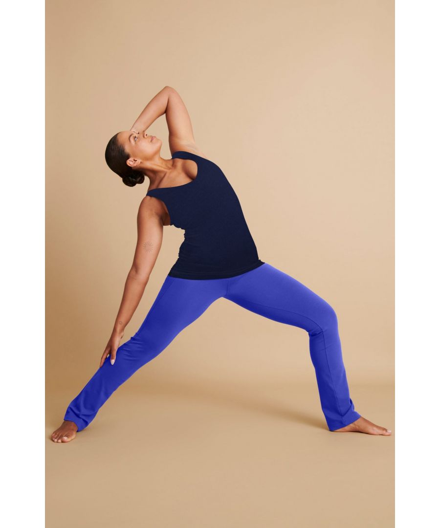 Our bestselling pants are practically perfect in every way. The classic slim leg cut is very flattering on your leg. Plus, we added seam details for fantastic bottom shaping and side seams for leg shaping.\n\nDesigned for Yoga and Pilates\nMade with Bambor®, our unique natural, performance fabric a blend of 60% Bamboo, 30% GOTS Organic Cotton, 10% Elastane\n\nNaturally sweat-wicking and breathable\n\nElasticated double depth waistband\nStraight leg\n\nFull length and 100% opaque \n\nAvailable in 3 leg lengths in Black & Navy\nFlattering seam bottom sculpting detail\nSuper soft and comfortable\nGreat for all sporting activities \n\nInside Leg Lengths:Regular Inside Leg Length: XS to XXL 82cm / 32€Also available in Short Length: XS to XXL 76cm / 30