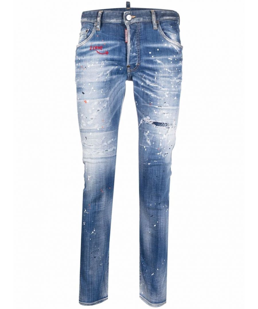 These Dsquared2 Jeans are crafted from cotton and consist of a five pocket style, paint splatter effect and a washed look.\n\n98% cotton, 2% elastane; pocket lining: 65% polyester, 35% cotton; application: 100% leather\nmachine wash (30°C)\nslim fit\nmid-rise\nFive-Pocket-Style\nbutton fastening\nembroidery\ndestroyed look\ncolour splashes\nunderlaid holes\nWashed out look