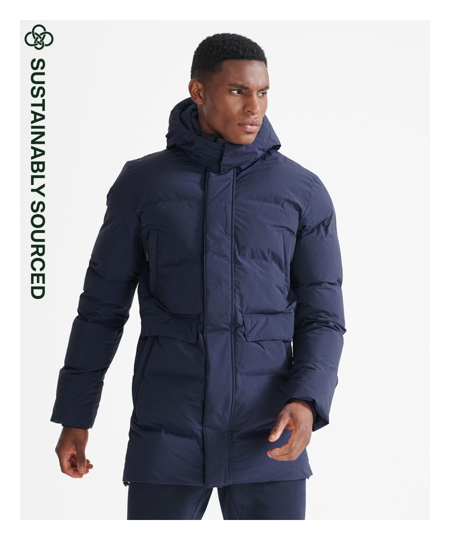 To get from door to gym, the Train Heavyweight Puffer Coat will keep you warm on your way to work up your own heat. Featuring a zip and popper fastening, popper and zip pockets, removable hood, sustainable filling and metal branding.Loose Fit – where comfort meets cool, a stylish loose cut makes this a must-have shapeDurable water repellency - This fabric has been coated with an advanced water-resistant finishThermal qualities - Helps to provide added warmth and assists in thermoregulationZip and popper fasteningFour front pocketsPopper collarRemovable hoodPuffer designMetal logo badgeThe padding in this jacket is 100% recycled, each jacket contains up to 30 recycled bottles, this avoids these bottles being sent to landfill or polluting our oceans.