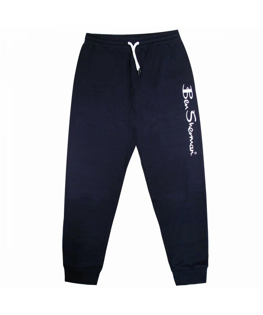 Ben Sherman Men's Large Logo Joggers Various Colours\n\nFeatures:\nBen Sherman brushback fleece joggers\nPrinted and woven tab branding\n98% cotton 2% viscose\nElasticated drawcord waist\nTwo slip pockets\nOne rear pocket\nRibbed ankle cuffs