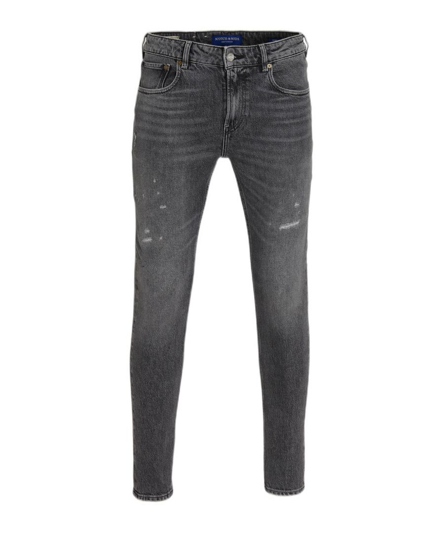 Deze skinny fit jeans voor heren van Scotch & Soda is gemaakt van stretchdenim. Dit 5-pocket model heeft een rits- en knoopsluiting.details van deze jeans:5-pocket