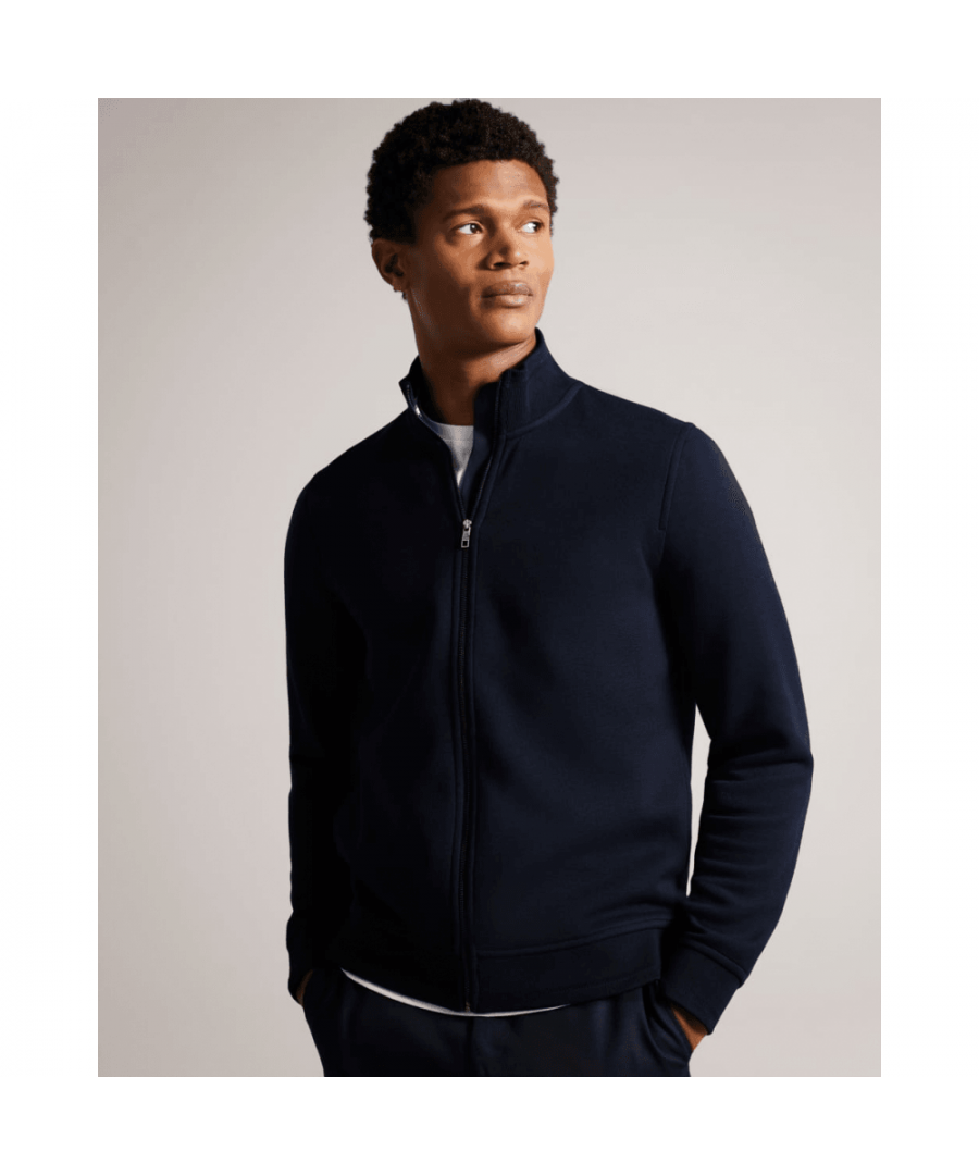Stay protected from the elements in style with this practical and stylish jacket. TYMOS's zip-through design and regular fit make it easy to wear, while the long sleeves and funnel neck provide added comfort. Convenient pockets allow you to keep your essentials close at hand. 74% Polyester, 26% Viscose.