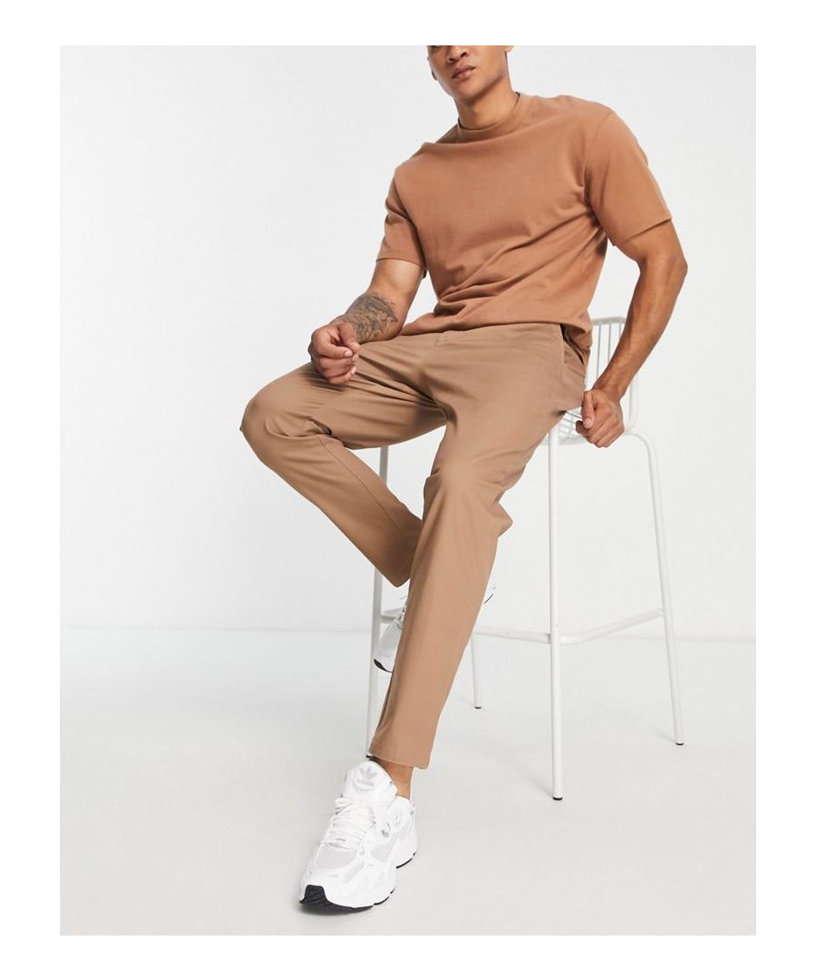 Chinos by ASOS DESIGN Treat your lower half Regular rise Belt loops Functional pockets Regular, tapered fit Sold By: Asos