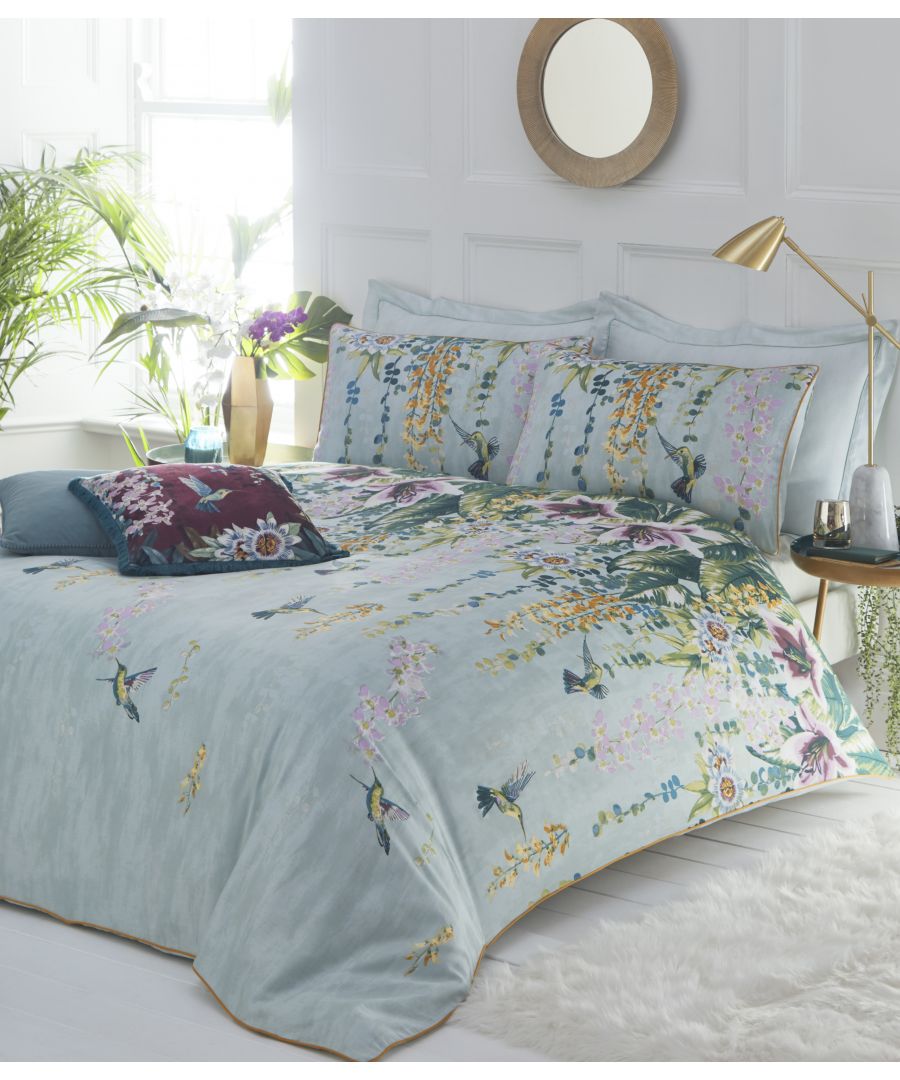 A tranquil and romantic design, our Hanging Gardens bedding features delicate hummingbirds fluttering between cascading lily, orchid and passion flower. This luxury cotton sateen bedding features warm ochre piping and a relaxing textured print on the duvet cover reverse. This duvet cover set has been produced to a meticulous standard, with a thread count of 200 threads per square inch, to ensure a soft, smooth and long-lasting fabric.