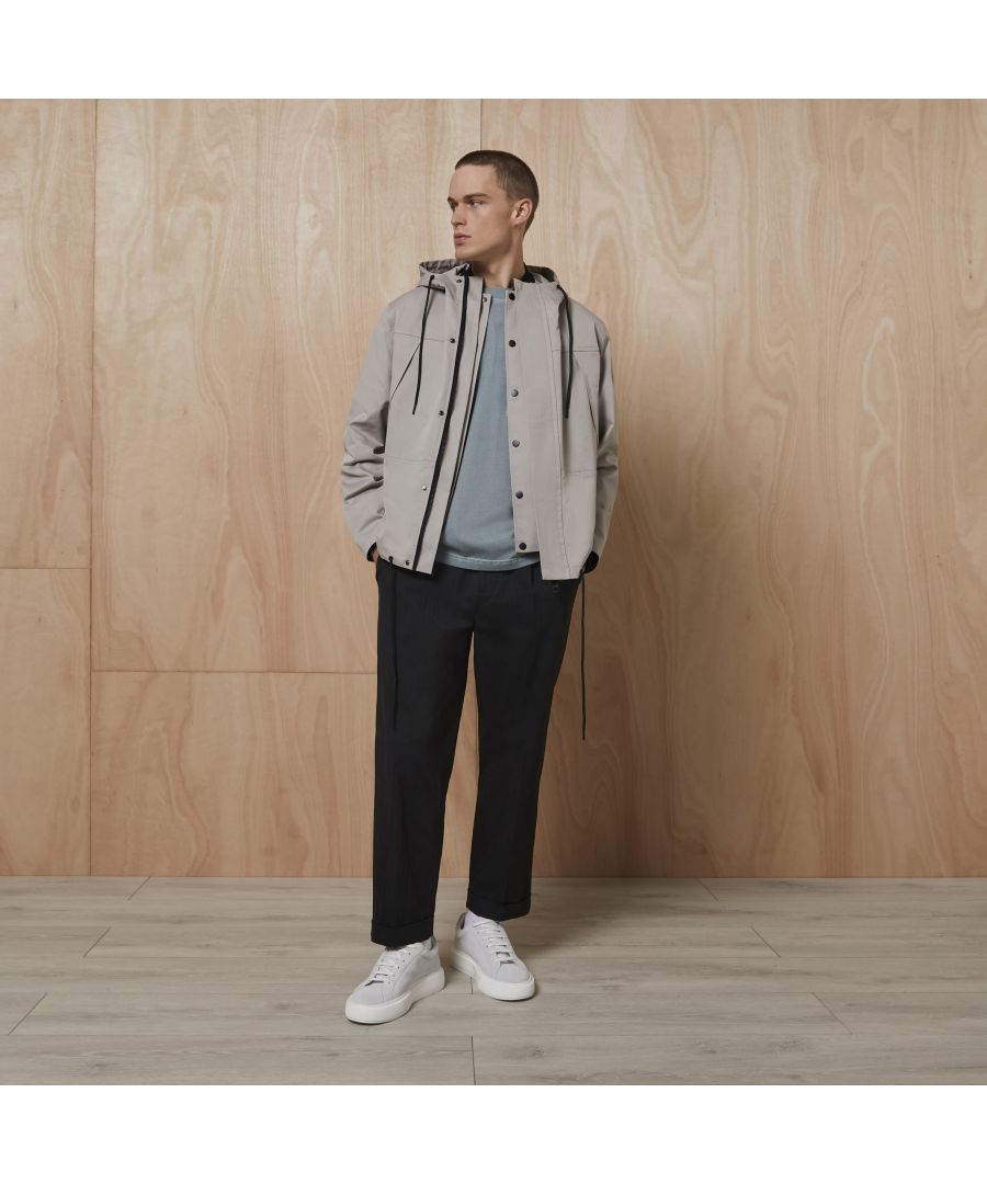 > Brand: River Island> Department: Men> Colour: Stone> Type: Jacket> Style: Parka> Material Composition: 59% Cotton 41% Polyester> Outer Shell Material: Cotton> Neckline: Hooded> Sleeve Length: Long Sleeve> Pattern: No Pattern> Occasion: Casual> Size Type: Regular> Closure: Zip> Season: SS22