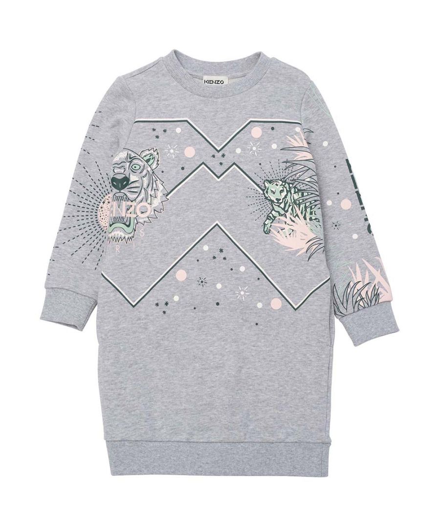 This Kenzo Girls Tiger Sweatshirt Dress in Grey is crafted from cotton and the length is slightly above the knee. It features long sleeves, concealed side pockets, ribbed trims and the Kenzo Tiger print at the front and logo at the back. 100% cotton.  Machine wash (30*C). Length: slightly above the knee.