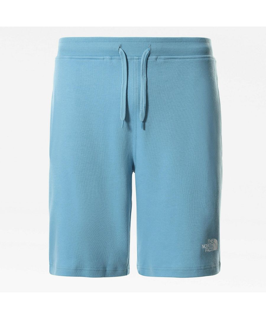 INTENDED USE: Urban exploration\nDETAILS: These laidback shorts are the summer essential every explorer needs in his weekend bag. Simple and comfy, they're made for days on the beach or relaxed moments in camp. This version has bold The North Face® logos on the front and back for an extra hit of style.\nStyle: 3S4F\nFabric: 100% Cotton\nInseam: R\nFEATURES\nShorts with two open hand pockets\nRibbed waistband with drawcord adjustment\nLarge logos on the front and back