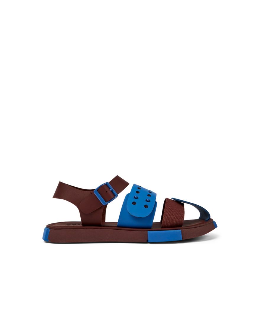 Blue and burgundy leather and recycled PET webbing men's sandals with EVA and rubber outsoles (20% recycled) and adjustable straps. \n\nOur Set is a lightweight style with multi-material straps made with recycled materials that support the foot and the planet.