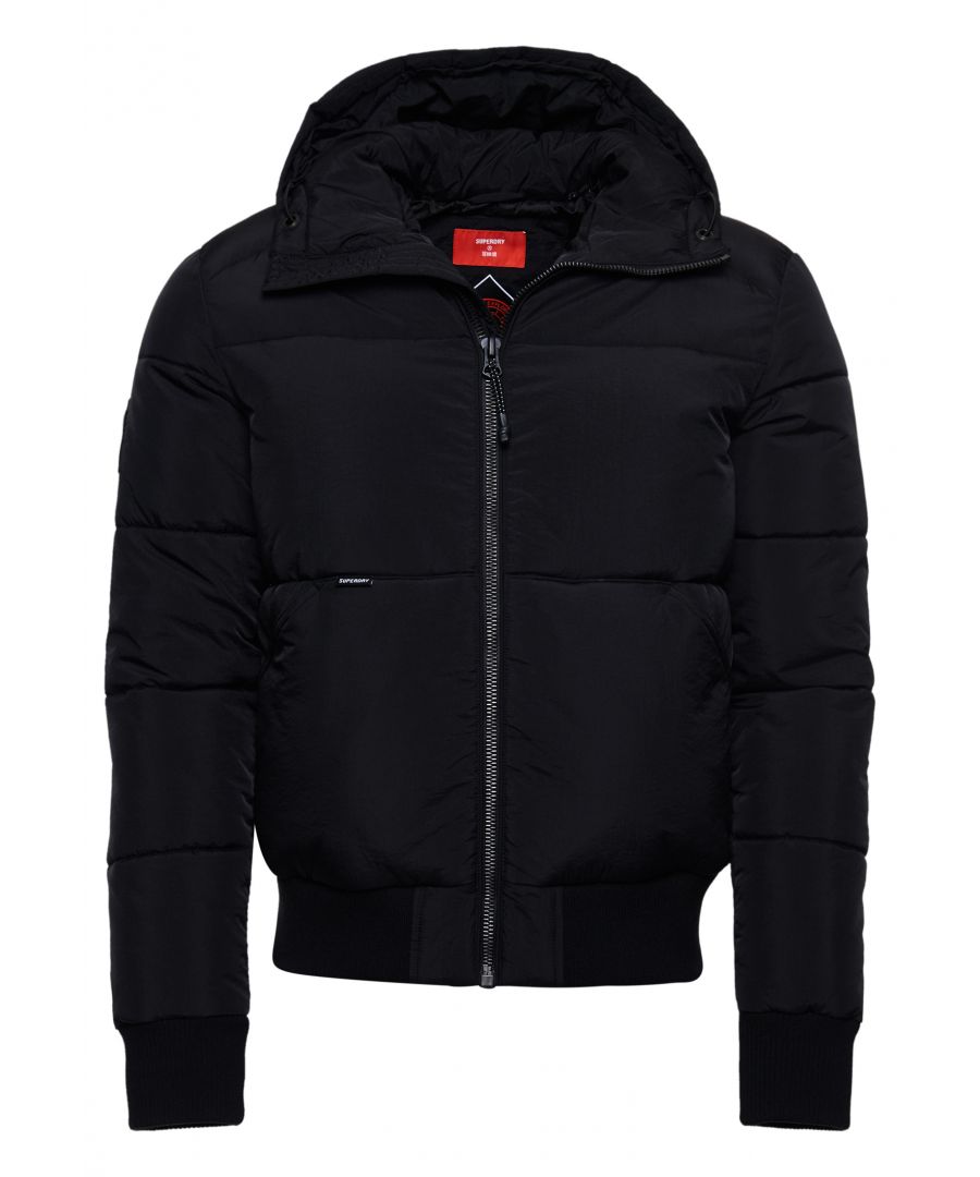 For when you dare to take on the outside but still need freedom of movement, our Mountain Recreational Jacket has you covered. It's sure to keep you warm with its padding and the ribbed cuffs and hem will keep the cold out. Its classic shape will give you flexibility whilst looking stylish.Relaxed fit – the classic Superdry fit. Not too slim, not too loose, just right. Go for your normal size.Main zip fasteningDrawcord hoodTwo front pocketsRibbed cuffs and hemRecycled paddingOne internal pocket with logo patchClassic Superdry logo tabIconic Superdry logo patchThe padding in this jacket is 100% recycled, each jacket contains over 30 recycled bottles, this avoids these bottles being sent to landfill or polluting our oceans.