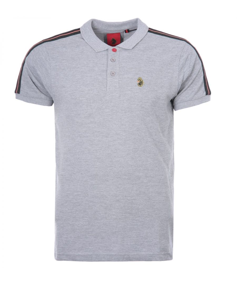 Luke 1977 is, without a doubt, the go-to brand if you're after well-crafted, witty and masculine products. Finished with the signature Luke Lion logo, you're looking at one of the UK's top contemporary menswear brands. The New Willtape Polo Shirt combines comfort and style, ensuring you look great in and out of the house. Crafted from pure cotton pique. Featuring a ribbed polo collar, a three-button placket, short sleeves with ribbed cuffs and elasticated tape on the shoulders and sleeves which is detailed with a raised LUKE 1977 text. Finished with the iconic Luke lion at the chest. Regular Fit, Pure Cotton Pique, Ribbed Polo Collar, Three Button Placket, Short Sleeves with Ribbed Cuffs, Raised Text Elasticated Jacquard Tape, Luke 1977 Branding. Style & Fit: Regular Fit, Fits True to Size. Composition & Care:100% Cotton, Machine Wash.