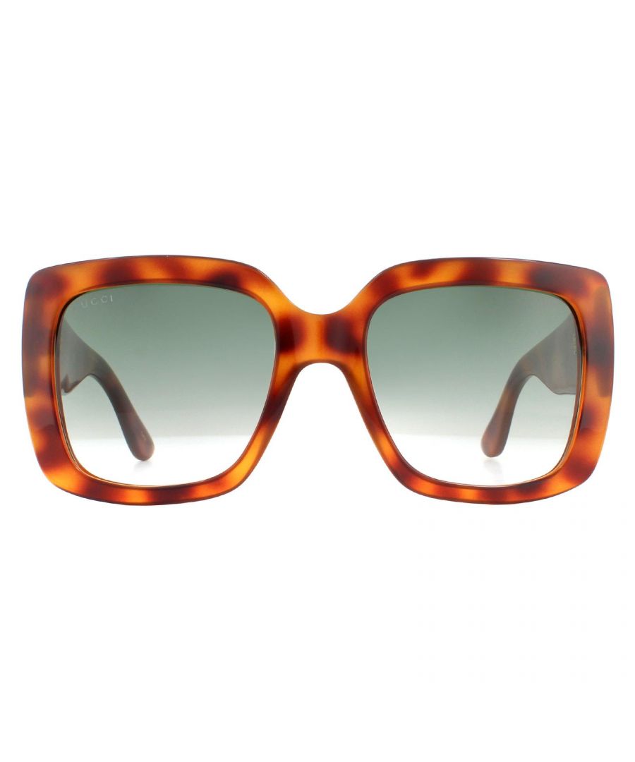 Gucci Sunglasses GG0141S 002 Havana Green are a chic oversized square design crafted from bold yet lightweight acetate. The thick temples are embellished with metal interlocking Gucci G logos.