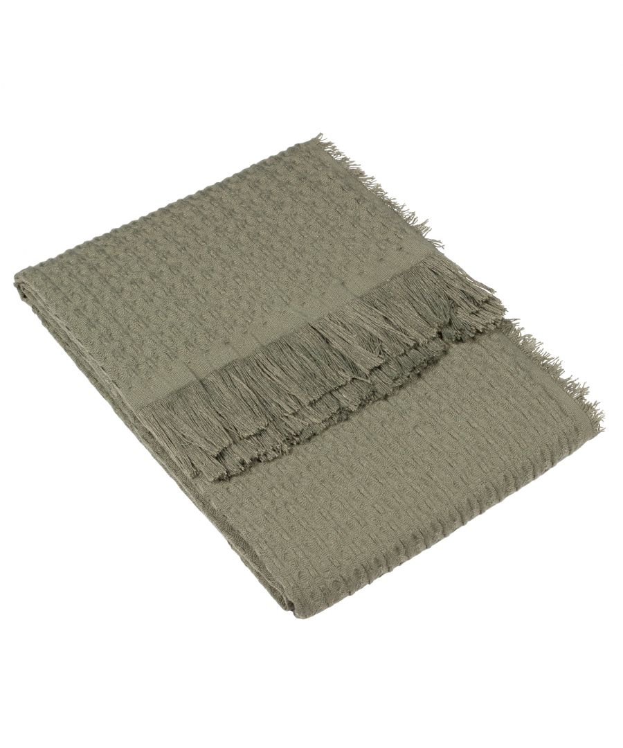 Add a timeless touch to your home with the ultra-soft Abel waffle throw. Crafted with a sophisticated waffle weave, it adds warm, natural tones to help ground your interior space and build up textural layers. Finished with a raw frayed edge on four sides to help further create a relaxed, understated look.