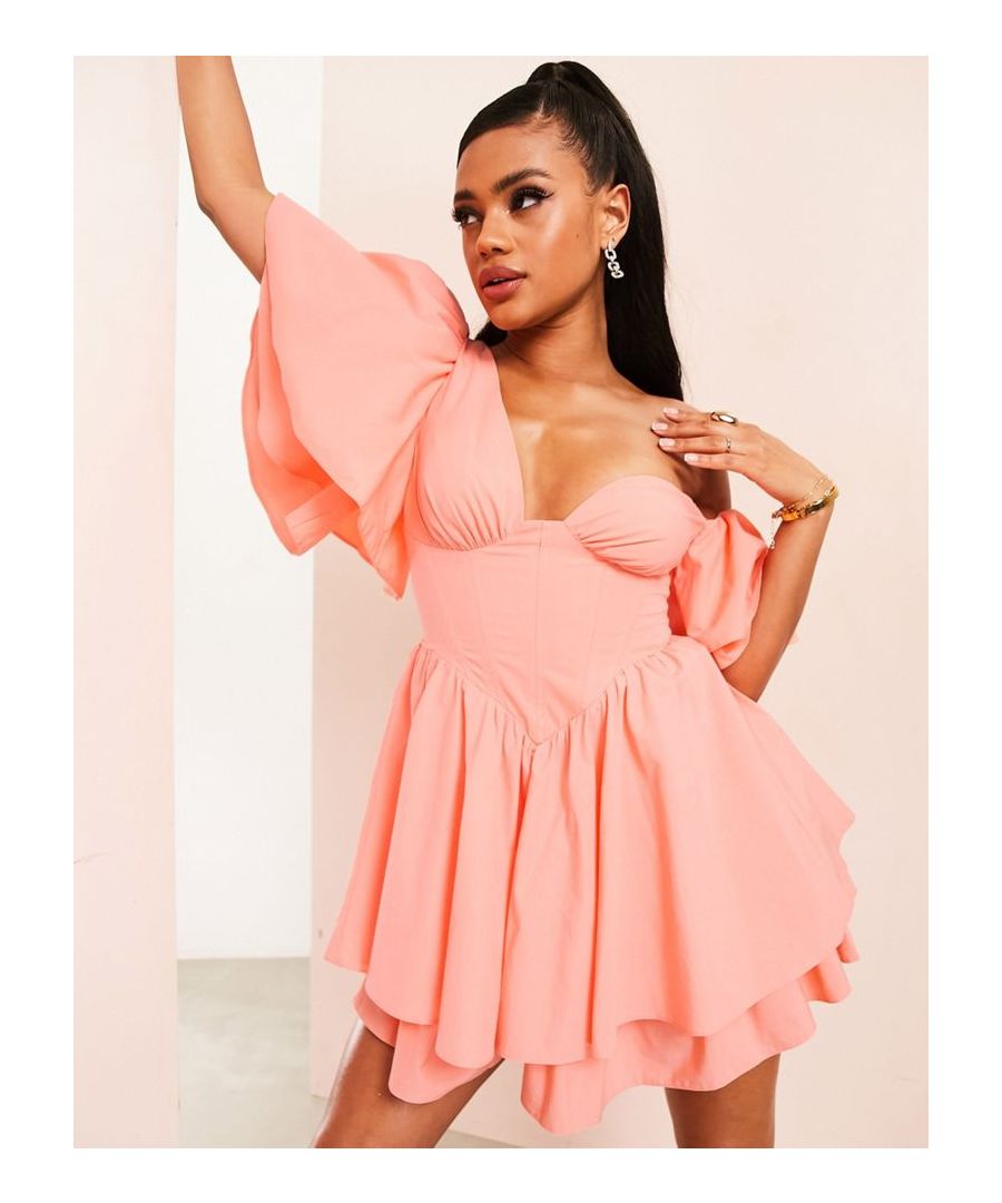 Mini dress by ASOS LUXE Love at first scroll Sweetheart neck Ruffle sleeves and hem Zip-back fastening Regular fit Sold by Asos