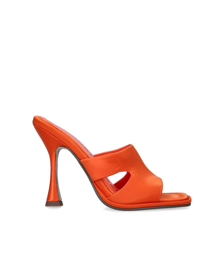 The Sawyer heel features an orange satin upper with cut out strap across the foot. The heel is slightly flared in stiletto style. Heel height: 11cm. Nude KG stud on the outer sole. This product is registered with The Vegan Society. Material: Satin.