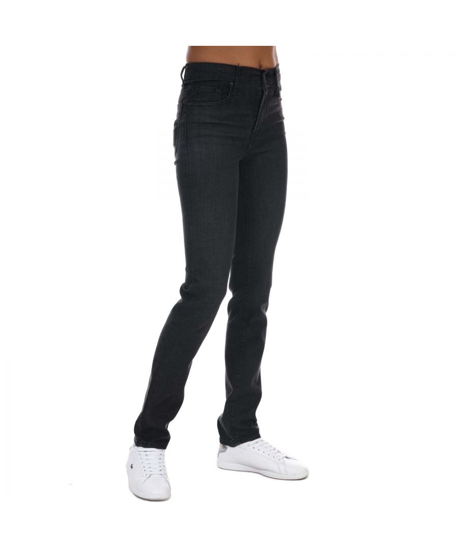 Womens Levis 724 High Rise Straight Jeans in  black.- 5-pocket construction. - Super skinny leg.- Zip fly and button fastening.- Patch bearing iconic Two Horse Pull logo.- Signature Levi's® tab and arcuate stitches on back pockets.- Straight leg.- Slim fit.- 70% Lyocell  18% Polyester  10% Cotton  2% Elastane.- Ref: 188830103