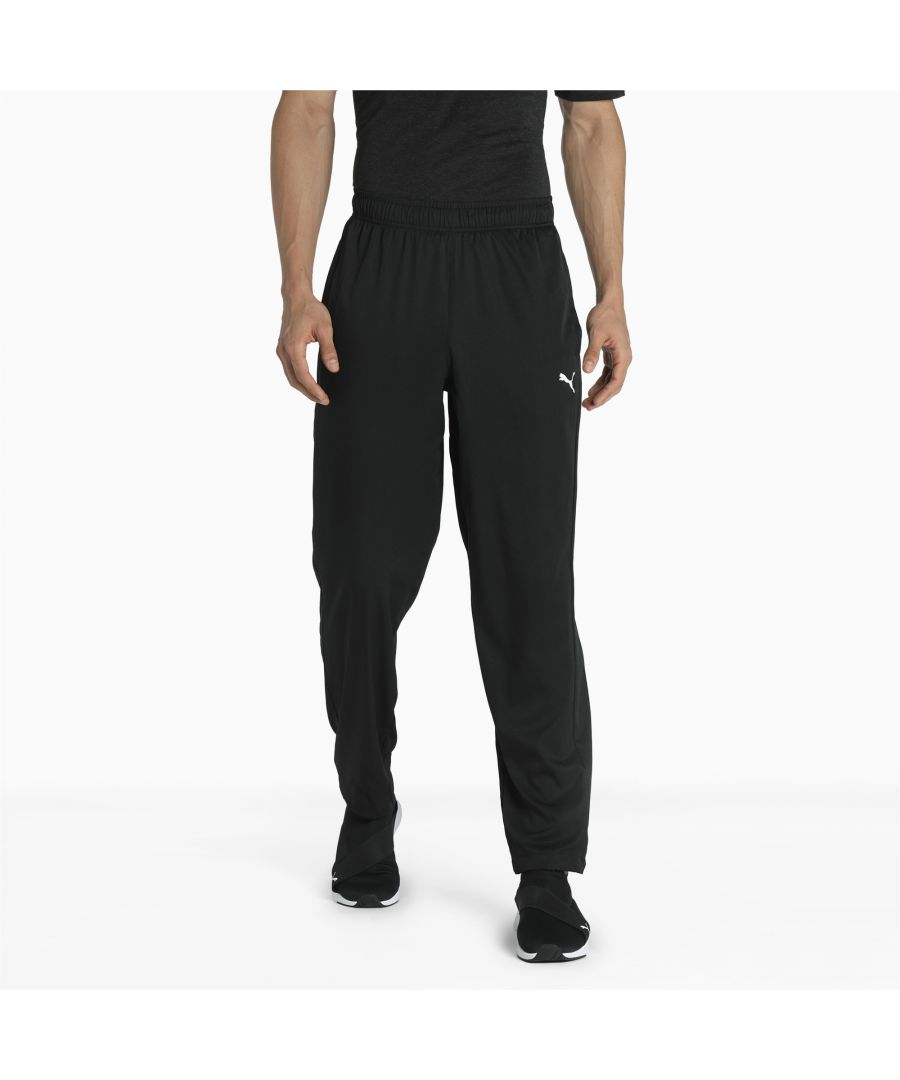 A simple pair of sweatpants is indispensable for any man's wardrobe. These woven pants are good for lounging around the house, and you could probably even use them instead of PJs, they're that comfy. They have dryCELL technology, which wicks moisture away from your body to keep you dry and cool. Giving you plenty of freedom of movement, these pants are a must-have. FEATURES & BENEFITS dryCELL: PUMA's designation for moisture-wicking properties that help keep you dry and comfortable. miDori®: Made with the bio-based finishing treatment miDori® bioWick. Contains Recycled Material: Made with recycled fibres. One of PUMA's answers to reduce our environmental impact. DETAILS Full length. Open bottoms.