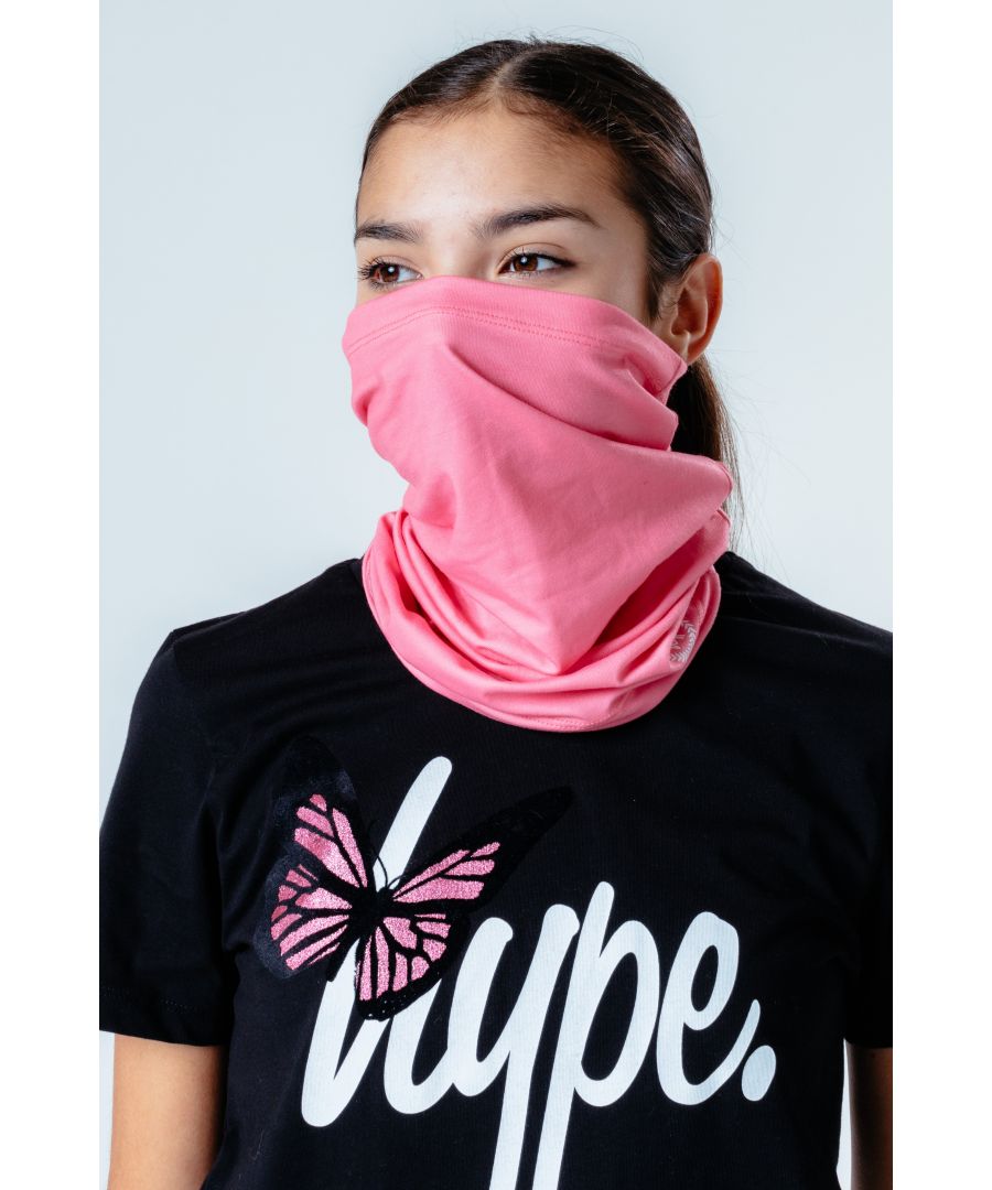 The HYPE. Pink Adults Multifunctional Headwear features a unisex design. Highlighting an all-over baby pink colour. Finished with the iconic HYPE. script crest. Designed in a soft-touch fabric for supreme comfort with a soft and breathable material for a comfortable fit. This men's and women's face covering can be used as a snood, bandana, headband, wristband, hairband, hood, head wrap and used as a face covering when in public places. Machine washable.