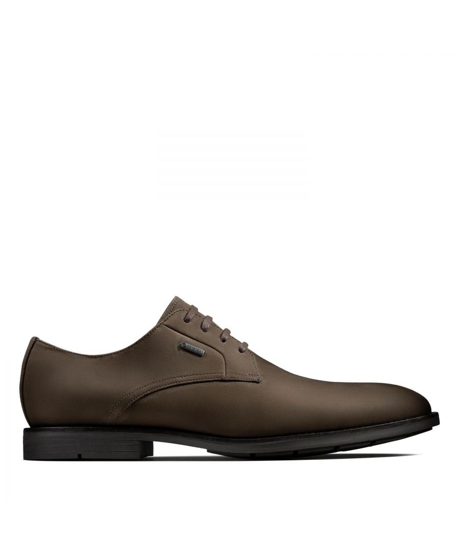 Clarks Men's Ronnie Walk GTX Shoes Dark Brown Nub G\n\nThe perfect lace-ups for smart occasions, these dark brown nubuck shoes from our Craftmaster collection feature a waterproof GORE-TEX Extended Comfort membrane to keep feet dry and offer a breathable feel.\n\nInspired by the archives and celebrating classic English footwear, these smart shoes use an outsole engineered to deliver grip whilst offering a sleek side profile.\n\nFeatures:\n\nUpper Material Nubuck\nLining Material Textile\nSole Material TR\nFastening Type Lace\nRemovable Insole No\nTrims Metal Trim