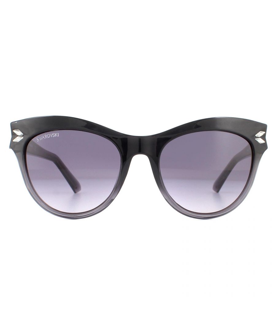 Swarovski Sunglasses SK0171 20B Black Grey Gradient are a feminine cat eye style crafted from acetate. The outer corners feature crystal detailing and the temples are decorated with the Swarovski text logo.