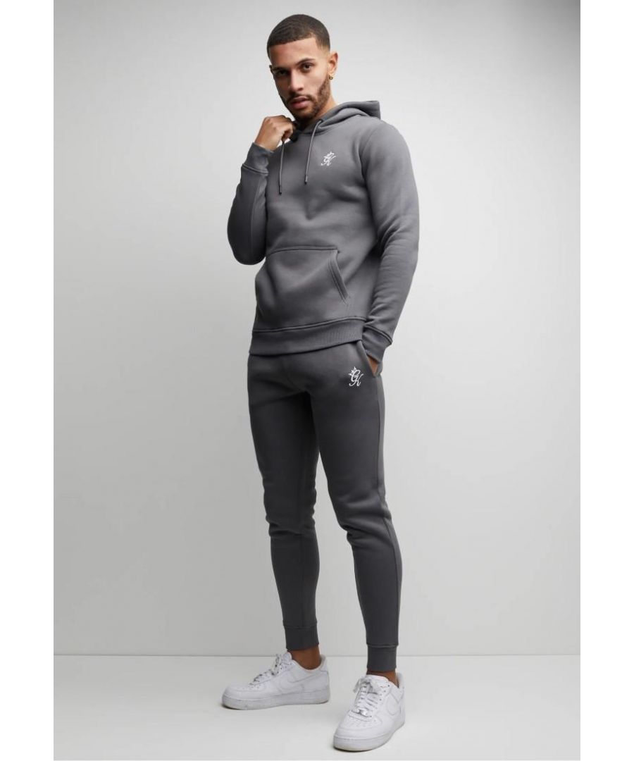 Gym King Men's Overhead Slim Fit Tracksuit Set.   \nSlim Fit, Ribbed Hem, Waist & Cuffs.   \nDrawstring Hood, Front Pocket.     \nEmbroidered Gym King logo in White on the Hoodie and Joggers.      \nElasticated Waist, Two Side Pockets Jogging Bottoms.