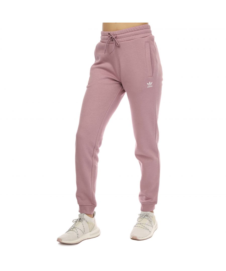 Womens adidas Originals Essentials Slim Fleece Joggers in mauve.- Drawcord on elastic waist.- Side pockets.- Ribbed cuffs.- Slim fit.- Main Material: 70% Cotton  30% Polyester (Recycled). Rib Part: 95% Cotton  5% Elastane. Lining Insert: 100% Cotton.- Ref: HH8873