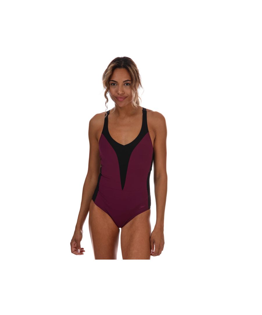 Womens Speedo Sculpture OpalLux Swimsuit in purple - black.Body shaping swimsuit  from the Speedo Sculpture collection.- XtraLife Lycra fits like new for longer with increased chlorine resistance.- ShapeComprexUltra fabric comfortably shapes and controls the tummy and waist.- Cut to shape and flatter your bust for comfort  fit and confidence.- Flattering V-neckline lengthens and slims the body.- Flattering V-back with crossover strap detail.- Integral bust support for added comfort and security.- Soft and smooth adjustable straps provide security and fit.- Medium bust support.- Medium leg.- Body: 69% Nylon  31% Elastane.  Lining: 100% Polyester.  Machine washable.- Ref: 8-12289D731Please note that returns will only be accepted if the hygiene label is still attached to the product.