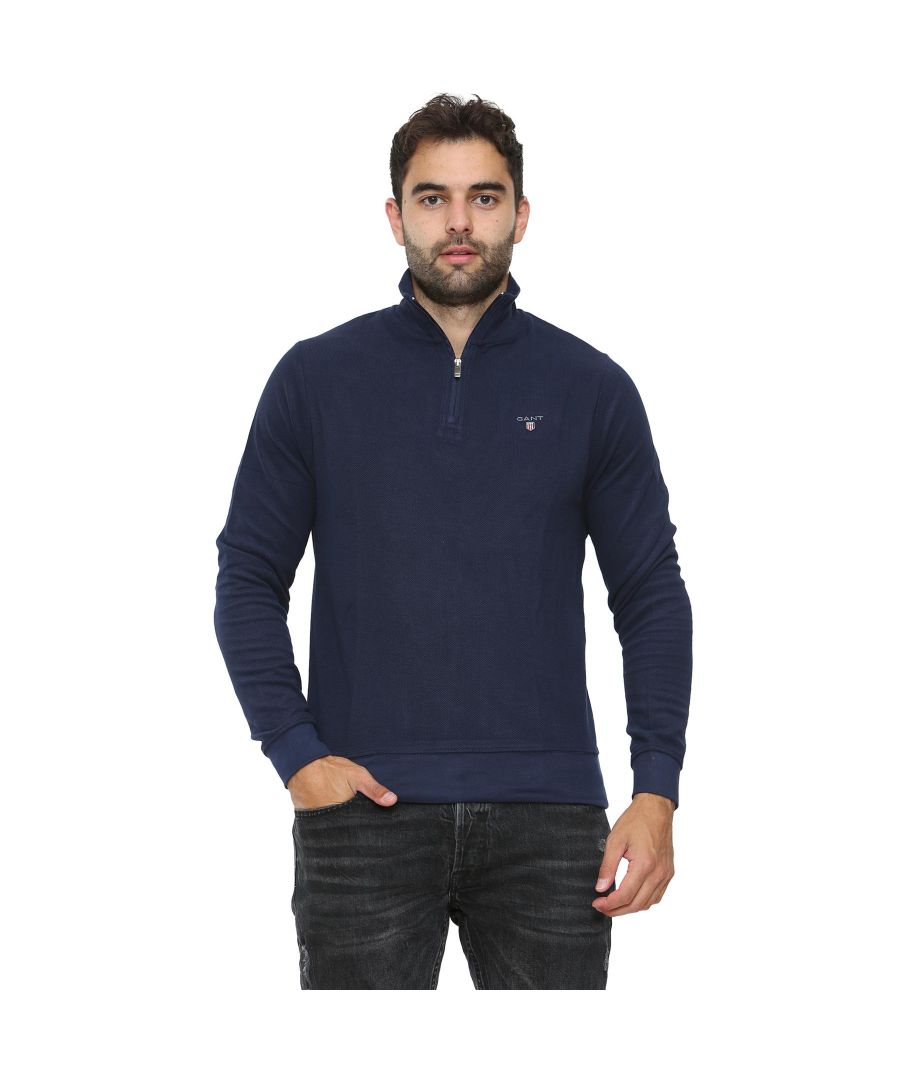 These Designer Gant Sweatshirts Features the Brands Signature Logo to the Left Chest. Styled with a Half Zip Fastening. Crafted with Cotton Blend, these Regular Fit Sweatshirts are Suitable for Casual or Workwear. Machine Washable