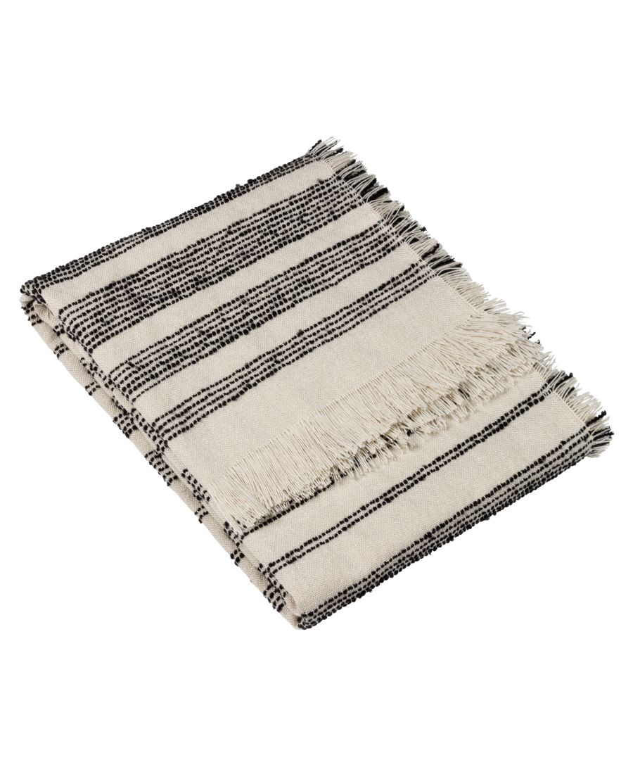 Understated and relaxed, the Jour throw is great for adding texture to a minimalist interior. Featuring sophisticated linear boucle yarn details which flow smoothly across the piece, along with four frayed fringed edges to complete an effortless layered look for your living space.