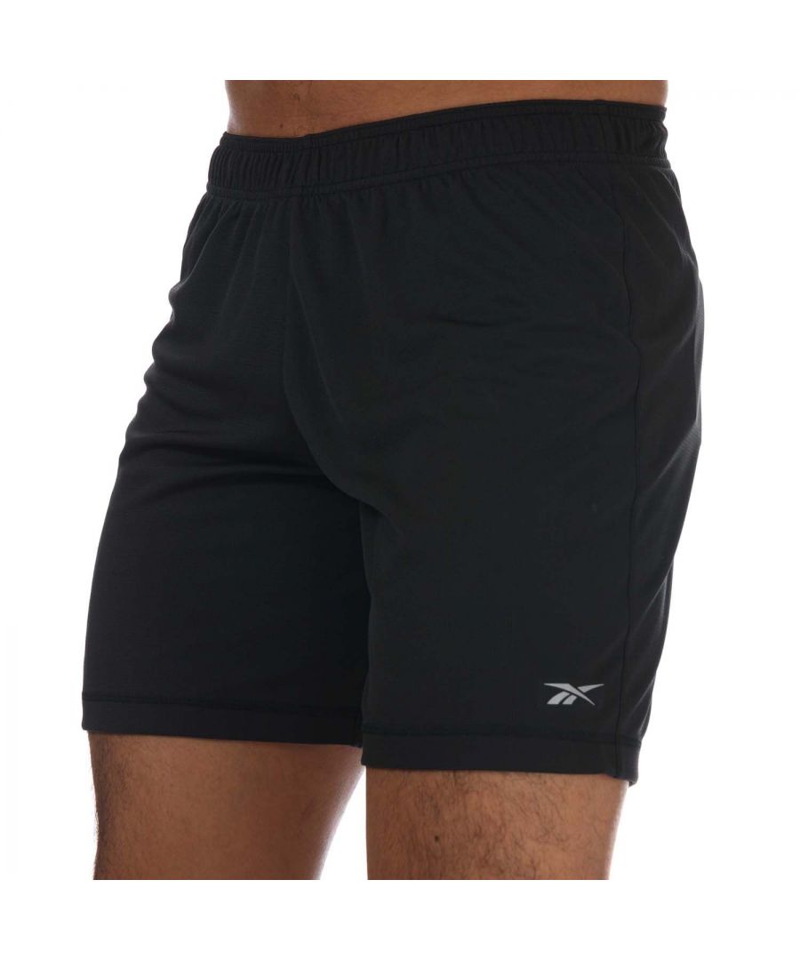 Mens Reebok Run Essentials Basic 7 Inch Shorts in black.- Drawcord-adjustable waist.- Speedwick fabric wicks sweat to help you stay cool and dry.- Reflective details.- Regular fit.- Main Material: 100% Polyester.- Ref: FT1056